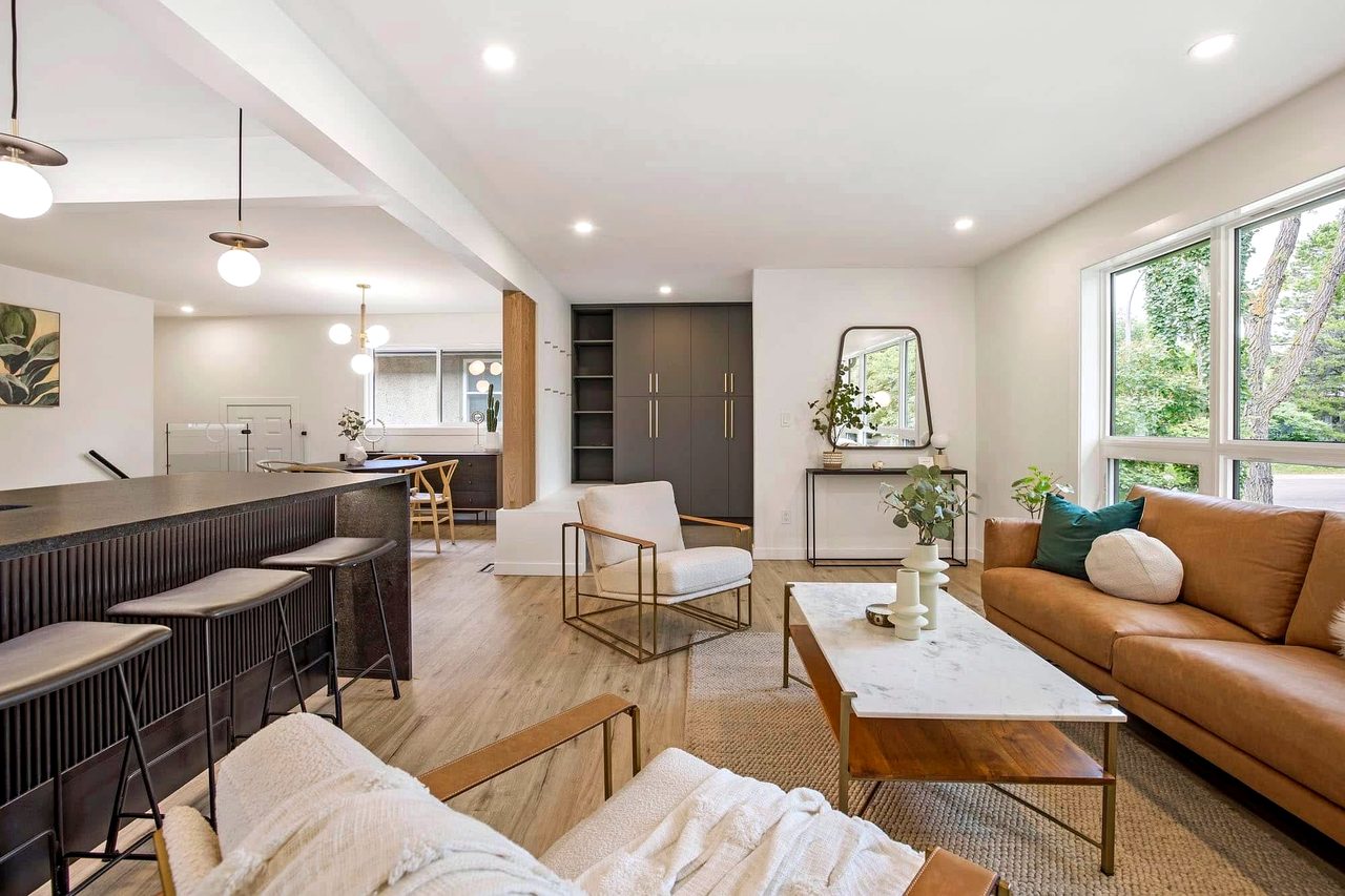 Finished basement development with new flooring and recessed lighting